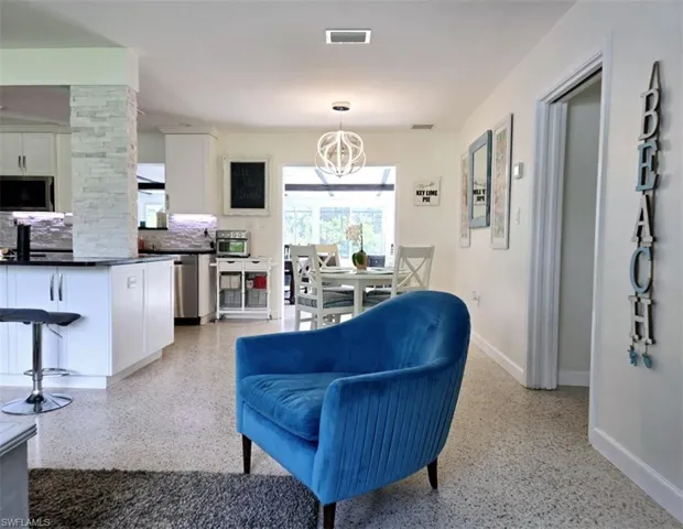 Living room with an inviting chandelier