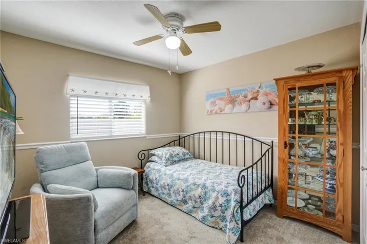 Bedroom with carpet floors and ceiling fan