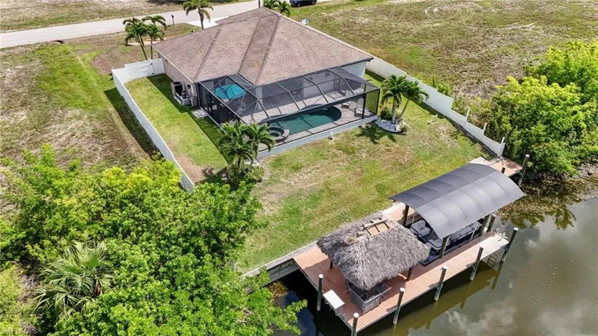 View of subject property with a large body of water