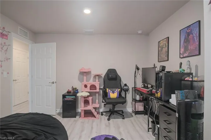 Bedroom featuring light hardwood / wood-style floors