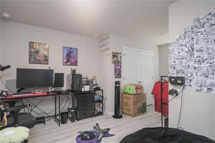 Home office featuring light wood-type flooring