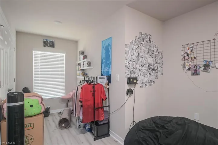 Misc room with light hardwood / wood-style flooring
