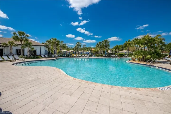 Community pool featuring a patio area