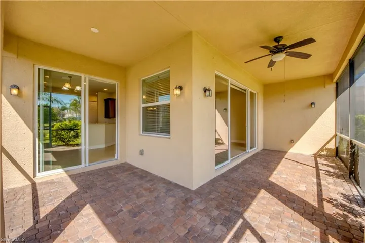 View of patio with a ceiling fan