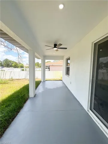 View of patio with ceiling fan