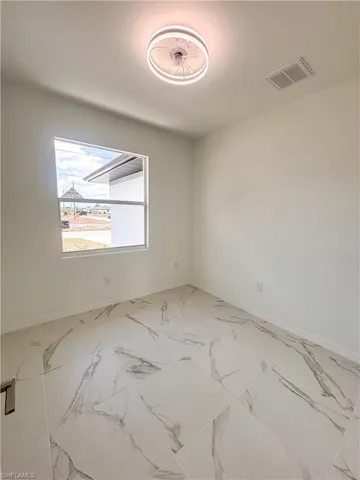 Empty room with baseboards