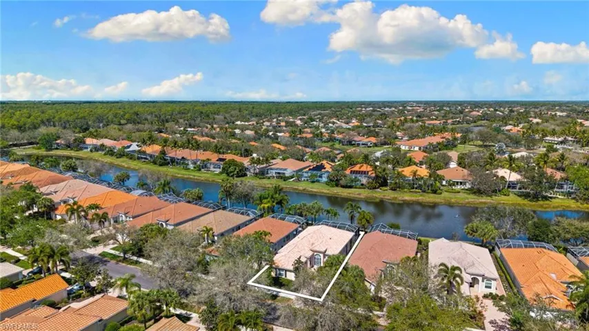 Aerial view of residential area with a nearby body of water