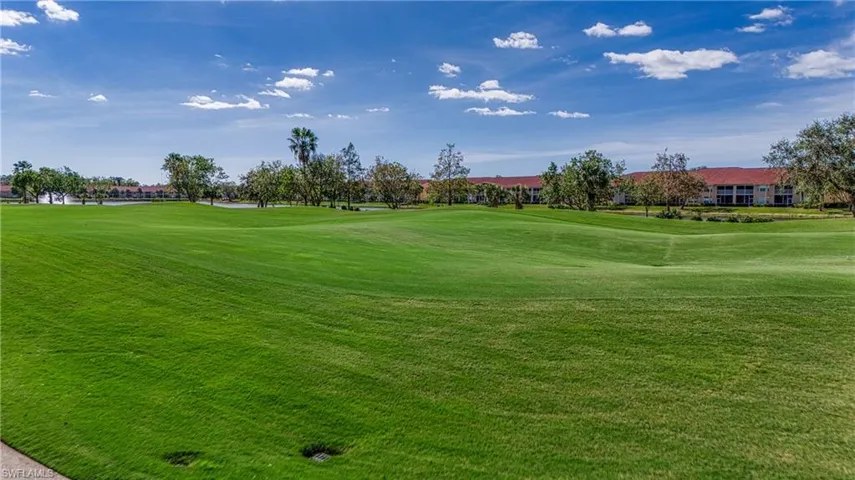 View of community featuring a lawn