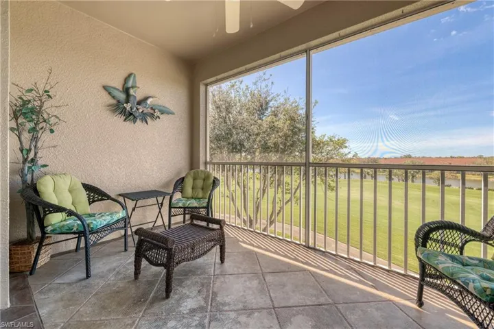 Sunroom featuring ceiling fan