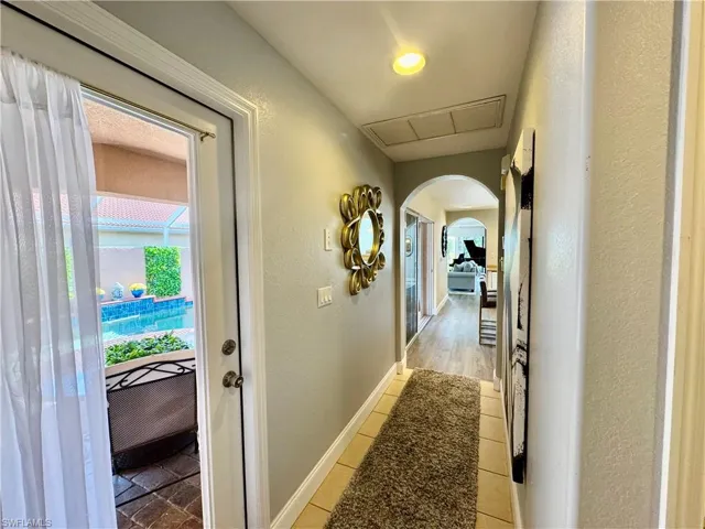 Hall featuring light hardwood / wood-style floors