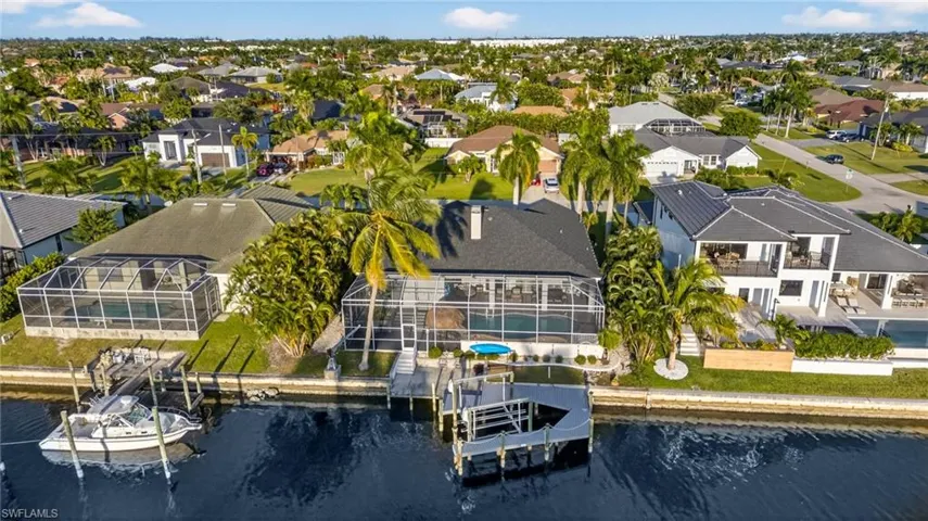 Aerial view of residential area with a large body of water