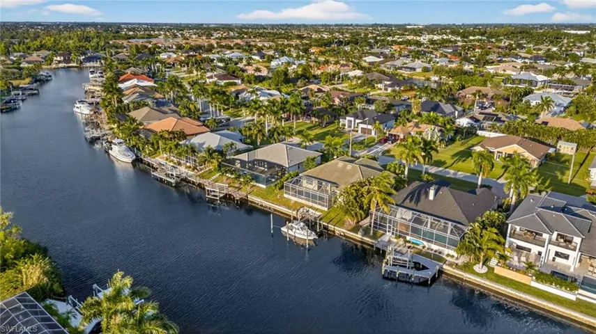 Aerial view of residential area with a nearby body of water