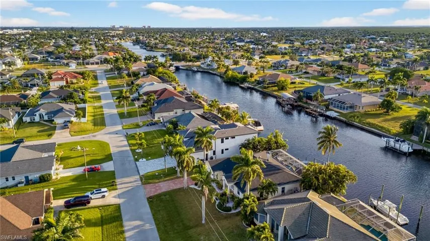 Aerial view of residential area with a large body of water