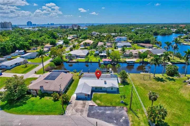 Aerial view with a residential view and a water view