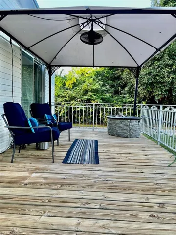 Wooden terrace with a gazebo
