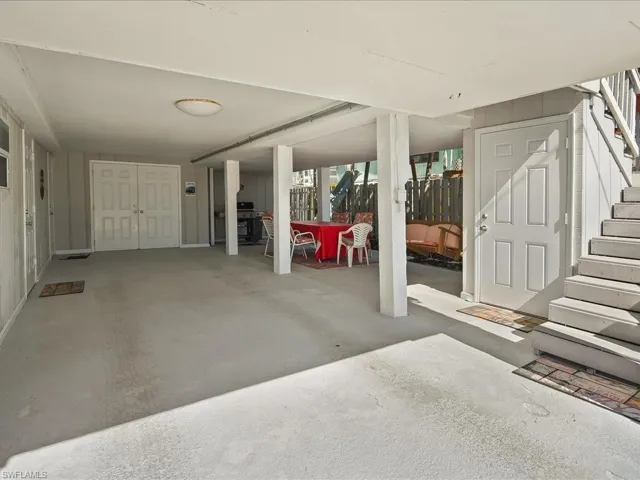 View of patio with a carport