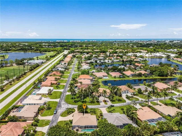 Aerial view of residential area with a large body of water