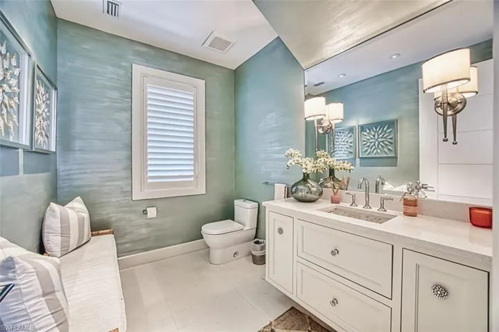 Bathroom featuring vanity and tile patterned flooring