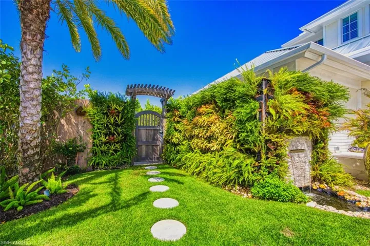Living wall, gate and water feature.