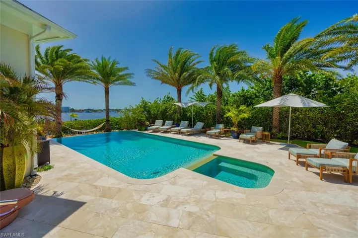 Swimming pool with a patio