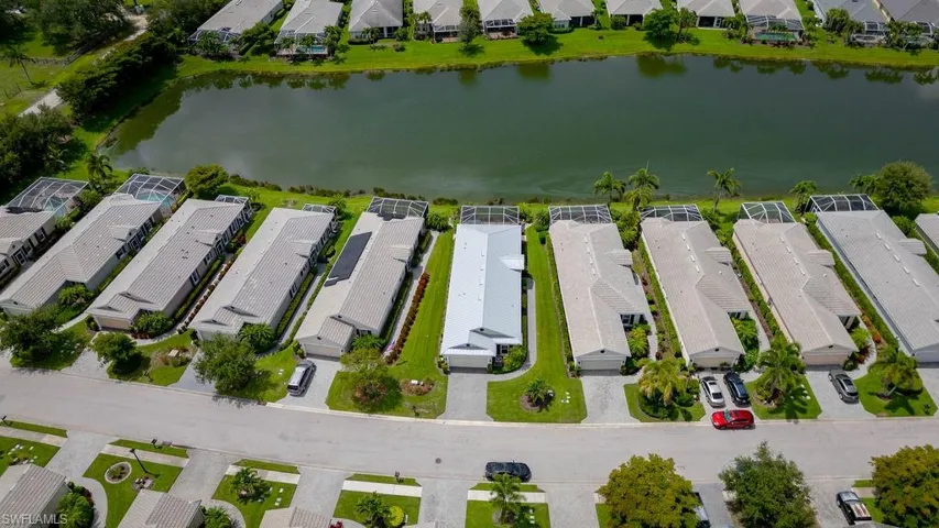 Aerial view of residential area with a large body of water