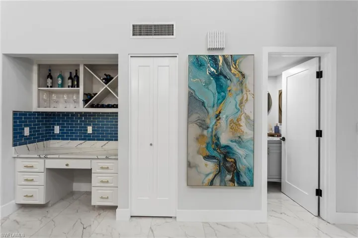 Built-in desk plus extra cabinets.