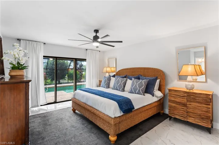 Spacious primary bedroom with an abundance of natural light!
