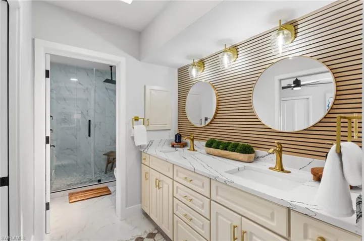 Guest bath with dual sinks-shared and entry with both guest bedroom.