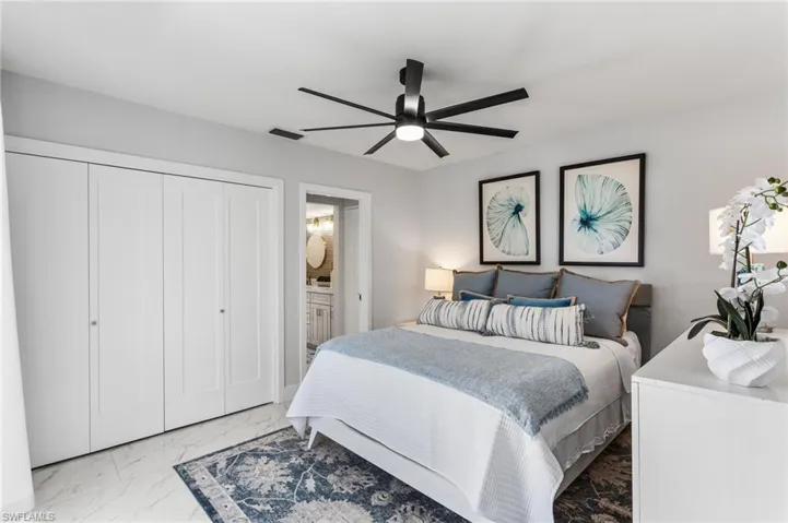 Guest bedroom with large closet and entry to the Jack n Jill Bath shared by the other guest bedroom.