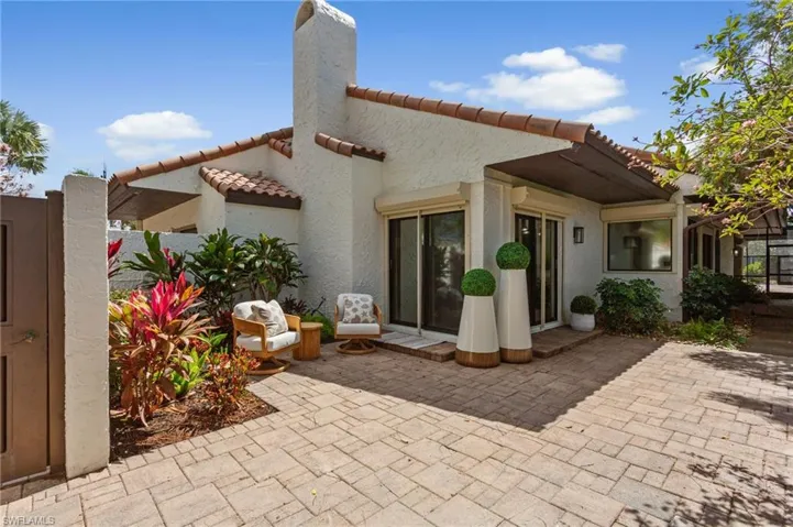 Enter the private gate to your villa...