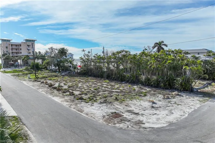 Lot photo from the street intersection looking northwest
