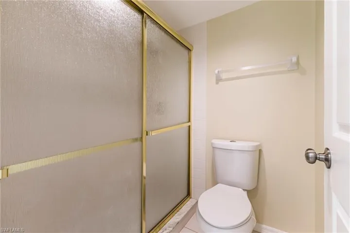 Bathroom featuring a shower stall