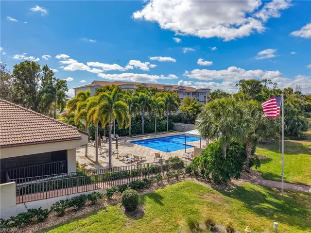 Community pool with a patio area
