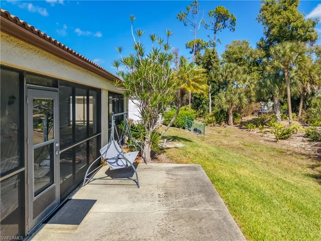 View of patio / terrace featuring a sunroom