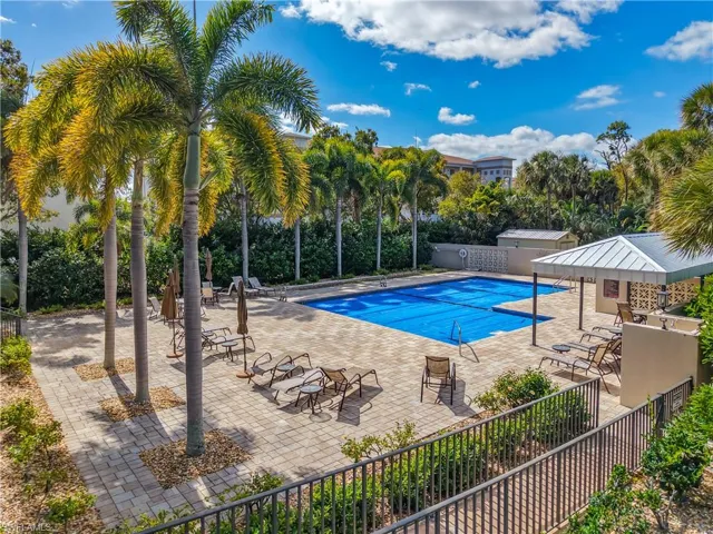 Community pool featuring a patio area