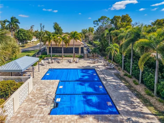 Community pool featuring a patio area