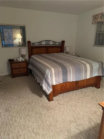 Bedroom featuring carpet floors