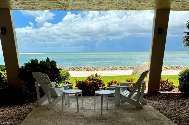View of patio / terrace featuring a water view