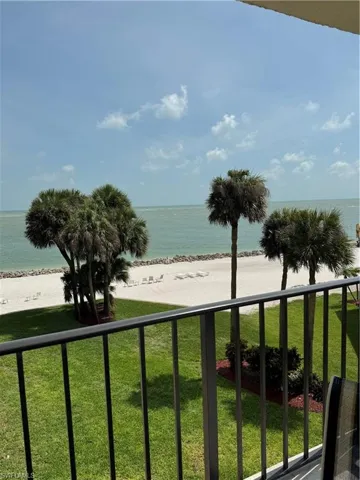 Property view of water featuring a beach view