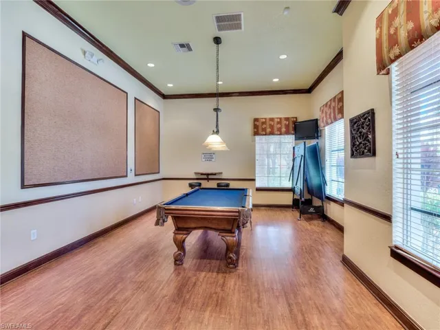 Game room featuring pool table, ornamental molding, and recessed lighting