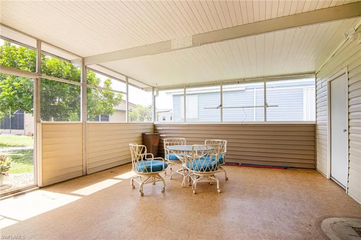 Sunroom featuring a healthy amount of sunlight