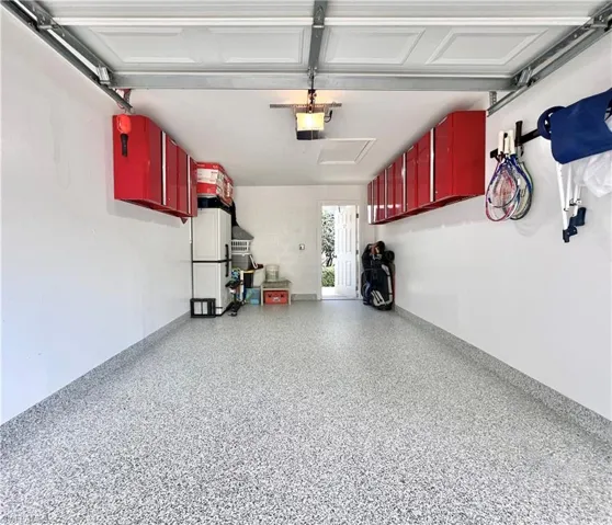 Dream Garage - Epoxy floors and Husky Wall Cabinets