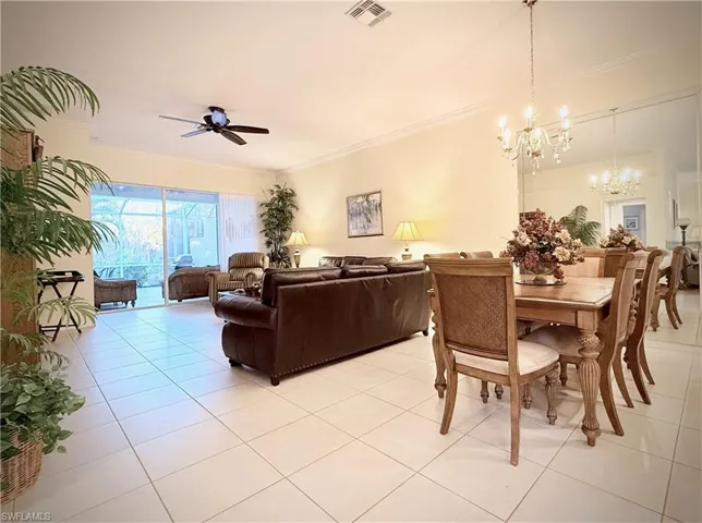 Dining/Living Room is Open Concept w/ Tile Floors
