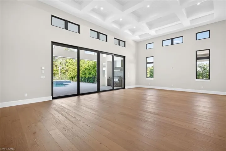 transom windows allow for more natural lighting throughout the great room