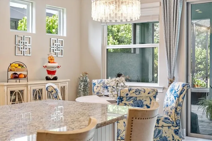 Dining space featuring a notable chandelier