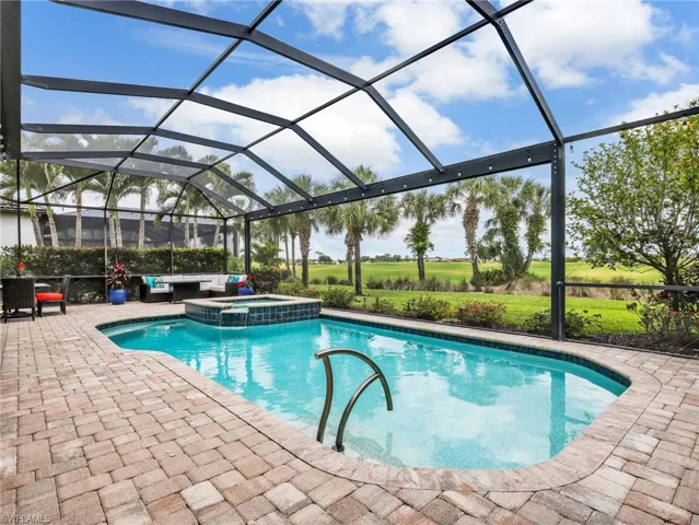 Lighted Heated Pool & Spa with Gas & Solar Heating with Fantastic View of the 17th Hole of the Golf Course, Panoramic Screen Enclosure & Privacy Hedges on Both Sides
