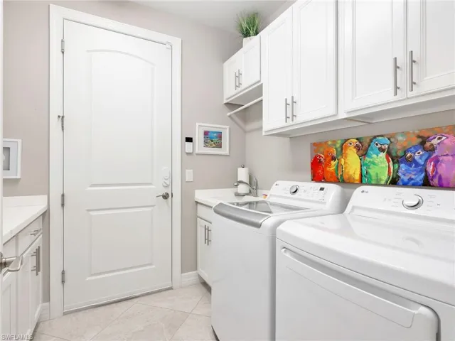 Finished Laundry Room with White Shaker Cabinets & Quartz Countertops for Extra Storage, Utility Sink & LG Top Load Washer & LG Dryer (replaced 2024)
