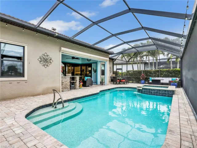 Lighted Heated Pool & Spa with Gas & Solar Heating with Fantastic View of the 17th Hole of the Golf Course, Panoramic Screen Enclosure & Privacy Hedges on Both Sides