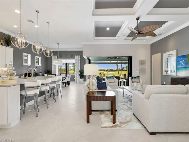 Kitchen, Dining Area & Great Room with Coffered Ceiling, Crown Molding & Golf Course Views