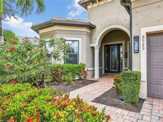 Front Entry with Paver Walkway & Lush Landscaping